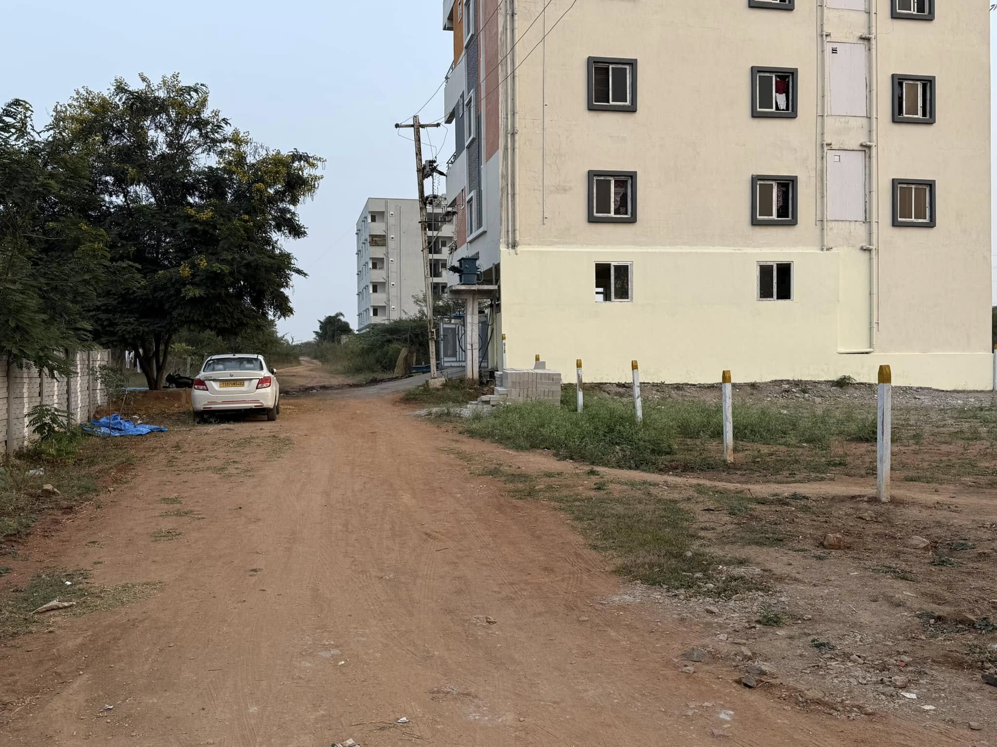 400 SQ.YD NORTH WEST CORNER PLOT - READY TO BUILD HOSTEL IN SRI MITRA LAYOUT -OPP.TCS ADIBATLA